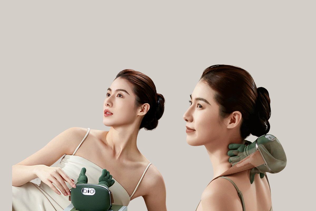 Woman using Relaxiz Smart Neck & Shoulder Massager for pain relief and relaxation